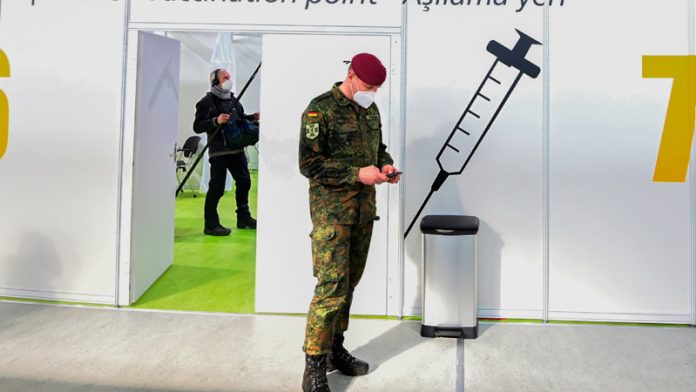 Germany scraps a COVID-19 vaccination requirement for military service people