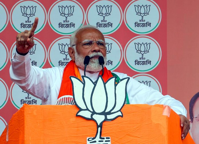 Prime Minister Narendra Modi addresses a campaign rally for Lok Sabha polls in West Bengal on Wednesday. (UNI)