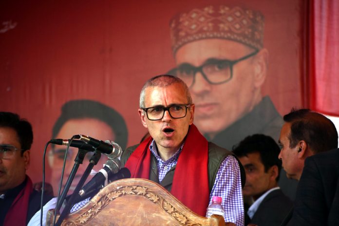 NC vice president Omar Abdullah addressing a public rally in Zadibal on Sunday. - Excelsior/Shakeel