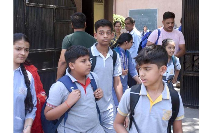 Students coming out of their school after a bomb hoax mail was received by several schools in New Delhi.(UNI)