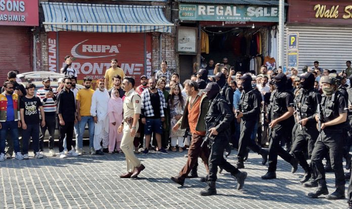 Bollywood stars Ajay Devgn and Jackie Shroff near historic Ghanta Ghar in Lal Chowk, filming a sequence of upcoming ‘Singham Again’ on Tuesday. — Excelsior/Shakeel