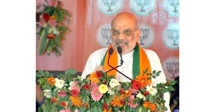 Union Home Minister Amit Shah addressing a rally in Odisha on Tuesday.