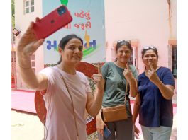 Girls taking selfie after casting their vote at a polling station during the 3rd phase of Lok Sabha elections, in Ahmedabad on Tuesday. Another pic on page 4. (UNI)