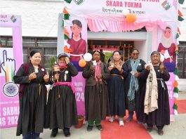 Female voters showing mark of indelible ink after casting their votes in Skara Yokma, Leh on Monday.