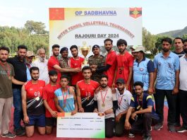 Winning team posing with trophy and cheque at ALG Rajouri.
