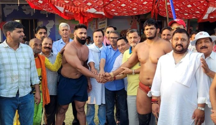Wrestlers being introduced before bout at Katra on Monday.
