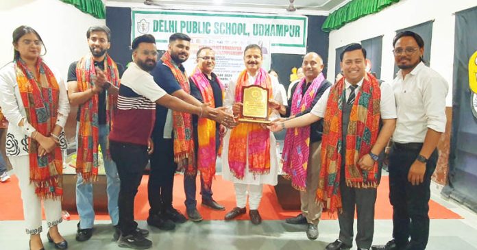 Management Delhi Public School, Udhampur presenting memento to Balwant Singh Mankotia.