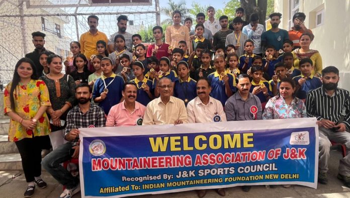 Medal winners of Udhampur and Reasi District Sport Climbing Championship posing with dignitaries.