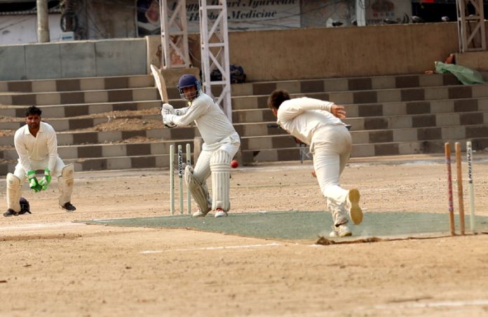 Batsman playing a shot during a match at Parade Ground, Jammu.—Excelsior/Rakesh