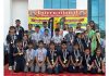 Students posing along with Chief Guest and school management during a programme on Friday.