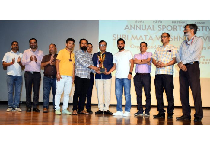 Chief guest presenting awards to players during the closing ceremony of SMVDU sports meet.