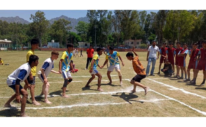 Players in action during a Kabaddi match at General Zorawar Singh Stadium, Reasi.