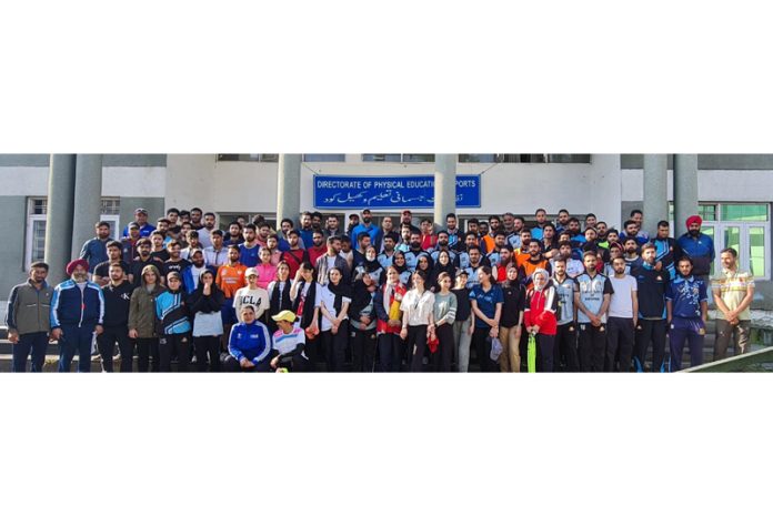 Students posing after participating in Inter Departmental Road Race organised at Kashmir University Campus.