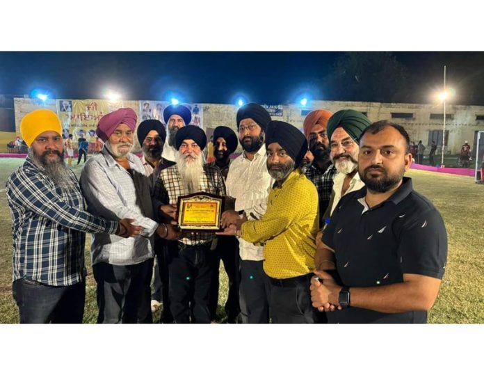 Management Committee presenting memento to the chief guest.