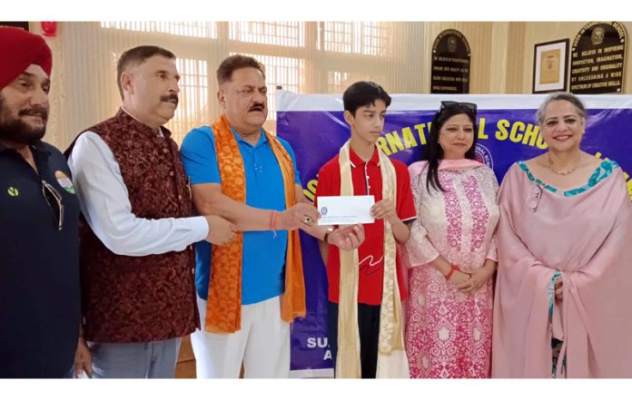 Management of DIS Jammu and officials of Gymnastics Association of J&K honouring Gymnast Ruddrakash Khanna.