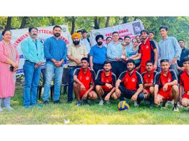 Er Arun Bangotra, Principal Government Polytechnic College Jammu posing along with Volleyball players and teaching faculty.
