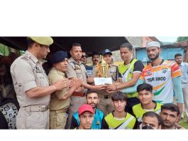 Winning team receives trophy from the chief guest on conclusion of Volleyball tournament organized by Range Police Headquarters Batote. -Excelsior/Tilak Raj
