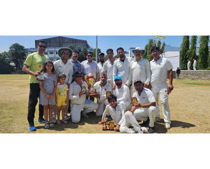 Winning team posing with trophy at KC Sports Club Ground, Jammu.