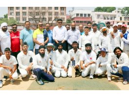 Cricket team posing along with dignitaries on second day of Ashok Sodhi Memorial T-20 Cricket Tournament at Jammu.