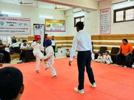 Taekwondo players in action during District Championship at Jammu.