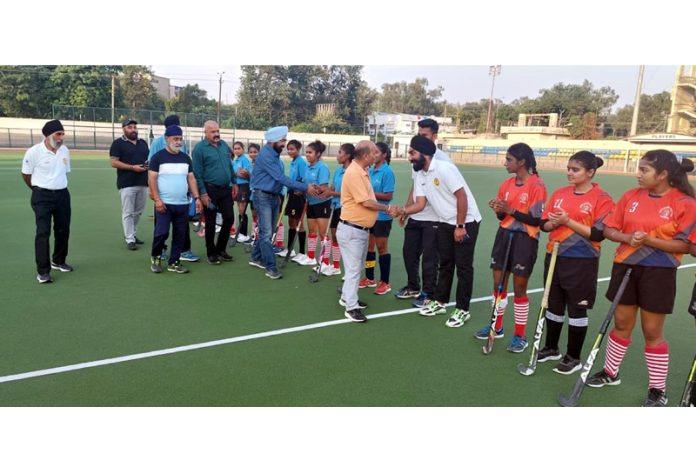 Chief Guests interacting with players before the start of Hockey match at Jammu.