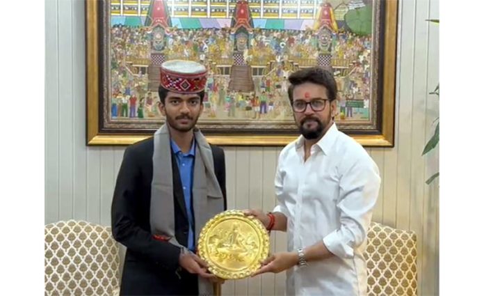 Indian chess star D Gukesh, who won the International Chess Federation (FIDE) Candidates title in April, met Union Sports Minister Anurag Thakur at his residence today.(UNI)
