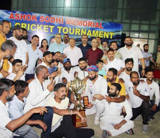 Dignitaries posing along with winners of Ashok Sodhi Memorial Cricket Tournament. -Excelsior/Rakesh