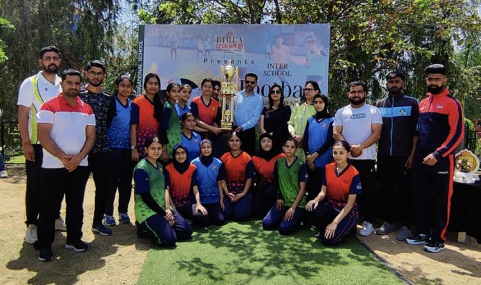 Winning team posing along with dignitaries on the final day of BOMIS Inter School Football championship at Jammu.