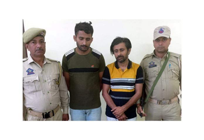A thief and his accomplice who were arrested by Samba police on Tuesday.