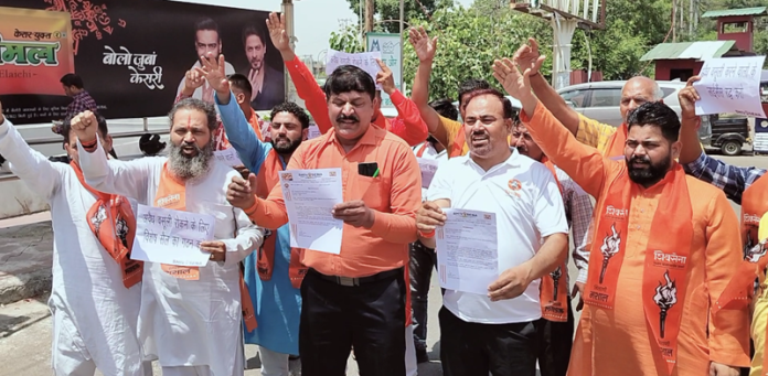 Shiv Sena leaders raising slogans during a protest at Jammu on Saturday.