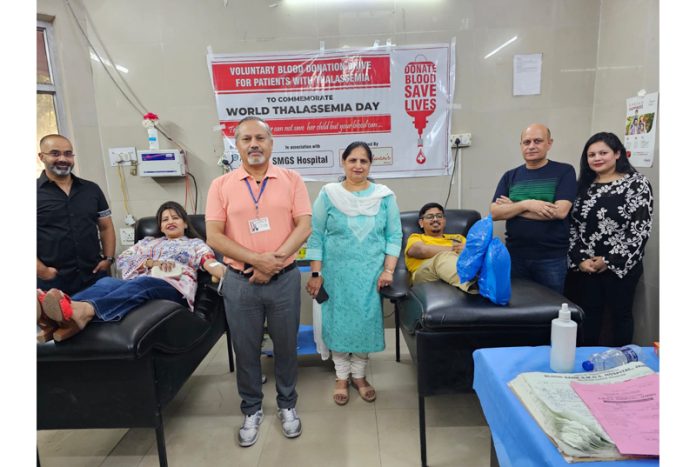 Principal GMC Jammu Dr Ashutosh Gupta and others during a blood donation camp at SMGS Hospital, Jammu.