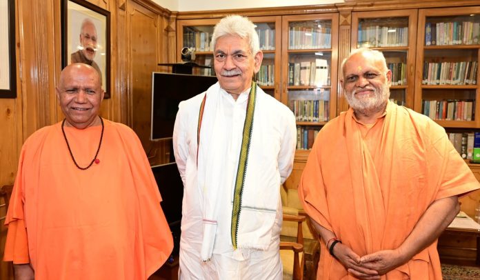 Swami Vishveshvaranand during meeting with LG.