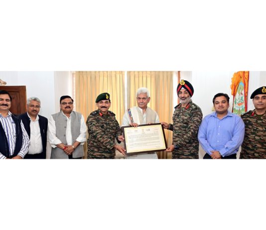 LG Manoj Sinha meeting with Lt Gen Gurbirpal Singh and others at Raj Bhawan on Friday.
