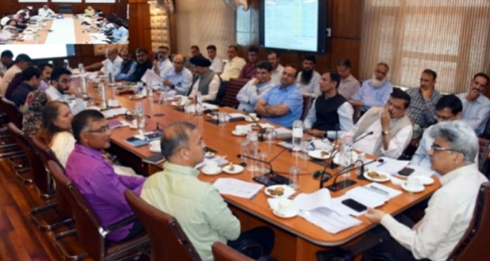 Chief Secretary Atal Dulloo chairing a meeting on Tuesday.