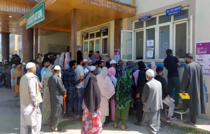 Patients, especially the elderly who are not familiar with smartphones, are facing difficulties at District Hospital Ganderbal. -Excelsior/Firdous