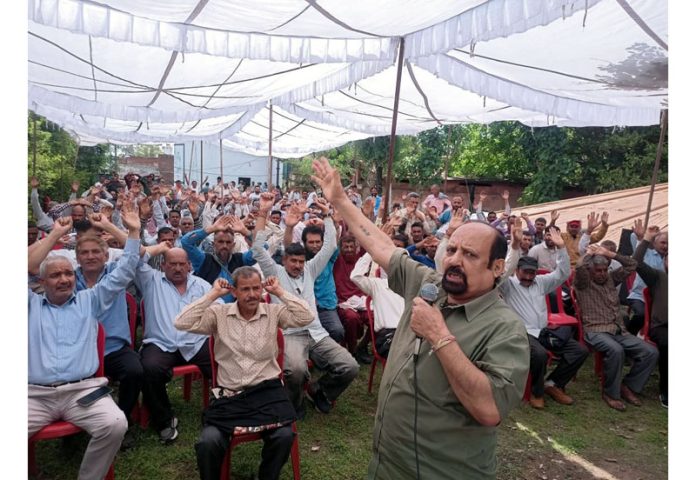 Senior Trade Union leader, Som Nath addressing rally of PHE workers at Udhampur on Wednesday.