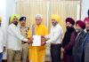 LG Manoj Sinha meeting with Sikh Coordination Committee Chairman Ajit Singh on Thursday.