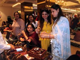 Women making purchases at the newly opened store of Tanishq in Jammu on Friday. -Excelsior/Rakesh