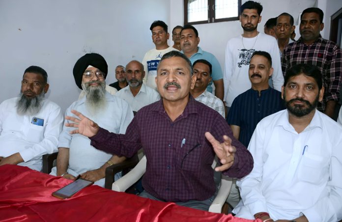 City Ration Dealers addressing a press conference in Jammu on Sunday. -Excelsior/Rakesh