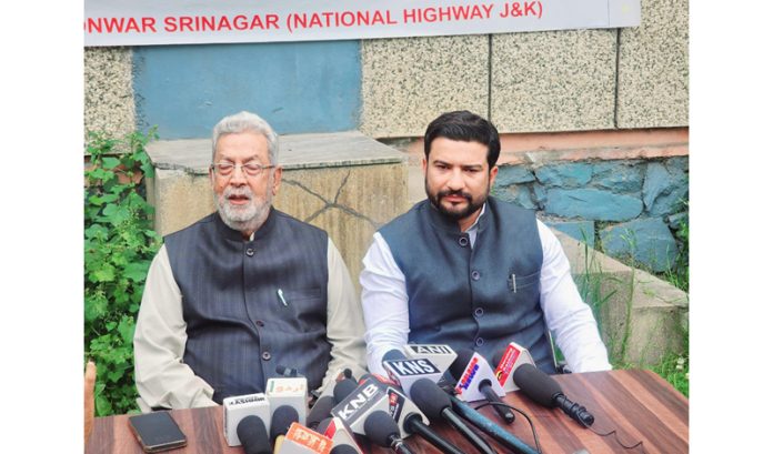 DPAP leader and former Minister, Taj Mohiuddin addressing press conference in Srinagar. - Excelsior/Shakeel