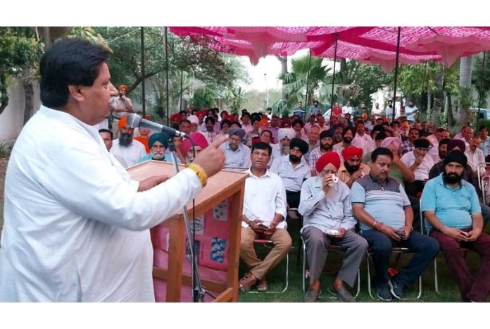 JKPCC working president Raman Bhalla addressing party workers meeting at Gadigarh in Jammu South.