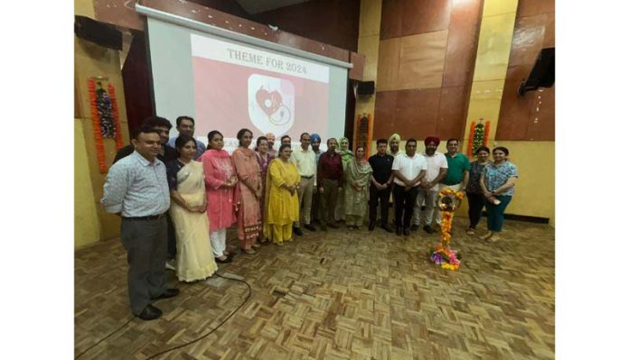 Guests and faculty members of IGGDC Jammu posing together during a programme in the College premises.