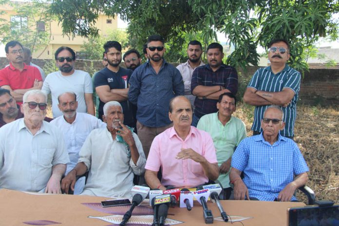A family alleging harassment by alleged land grabbers addressing media persons in Jammu on Saturday. -Excelsior/Rakesh