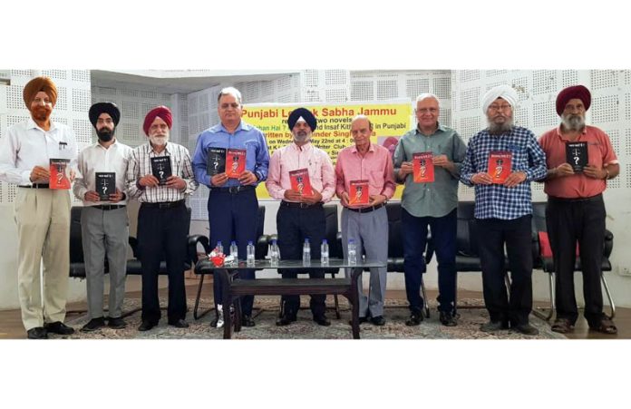 Padam Shri Dr. Jatinder Udhampuri releasing books written by Bhupinder Singh Raina in Jammu on Wednesday.