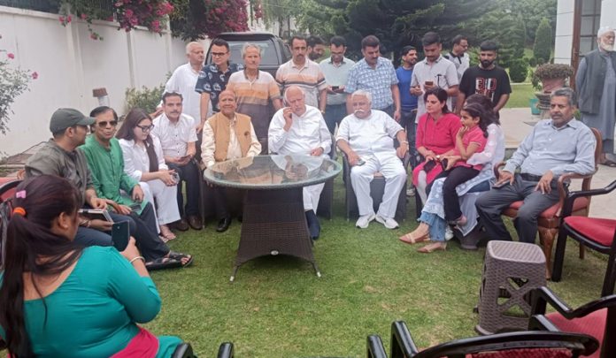 NC president Dr Farooq Abdullah in a meeting with a delegation of Kashmiri migrants.