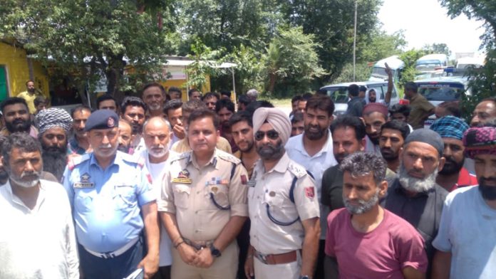 SSP Traffic NH Rohit Baskotra with drivers at Udhampur on Saturday.