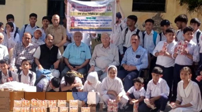NGO representatives during distribution of nutritious juice among students of Deaf and Dumb School, Jammu.