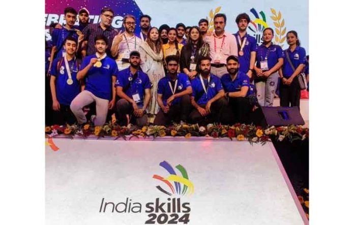 Participants posing for a group photograph during India Skill Competitions 2024.