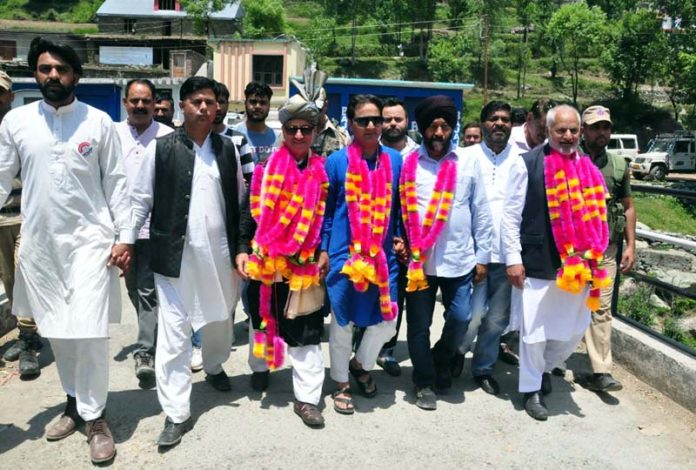 Senior Apni Party leaders led by Zaffar Iqbal Manhas taking out rally in Rajouri. -Excelsior/Imran
