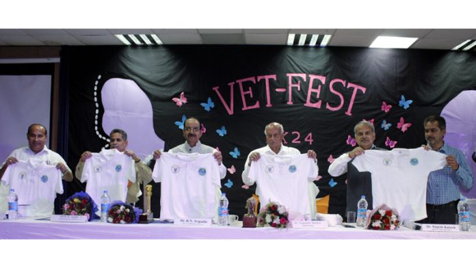 Guests launching specially designed Vet Fest 2K24 T-shirt during inaugural of three-day fest at SKUAST-Jammu.